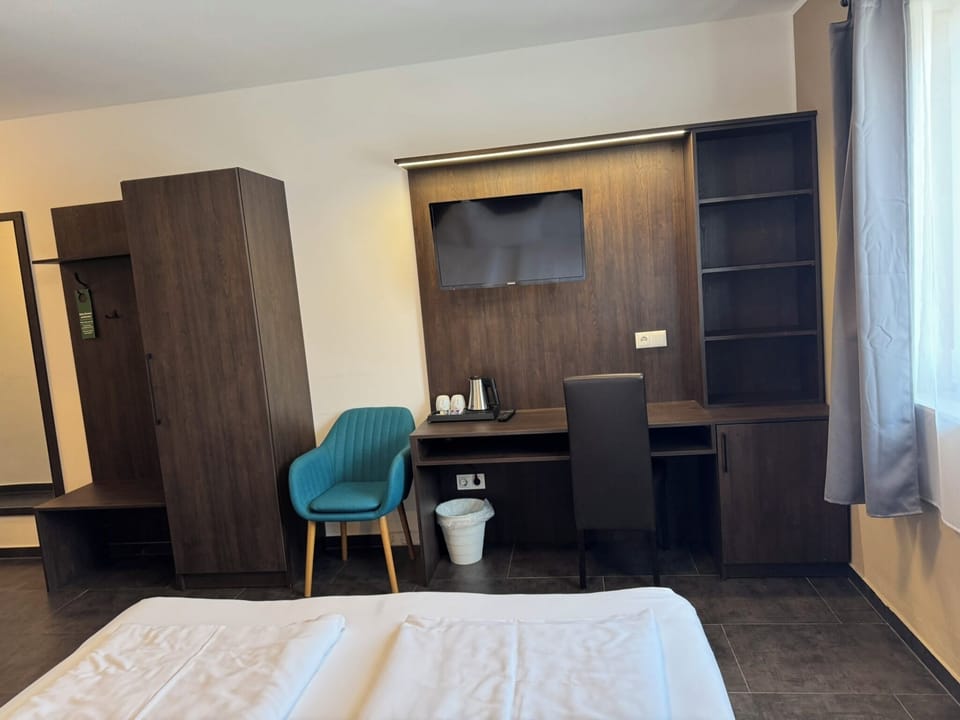 Double Room | Living area | 80-cm LED TV with satellite channels, heated floors
