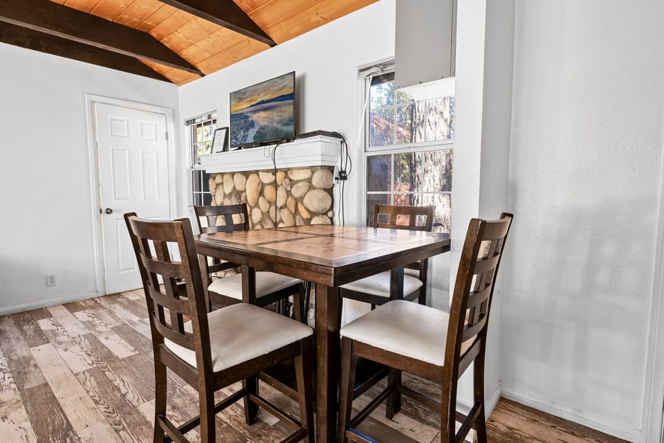 Bistro style dining table comfortably sits 4