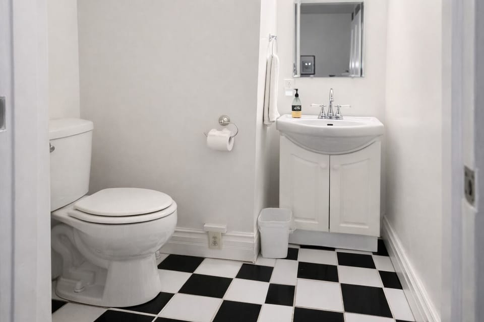 Convenient half bath located on main level off dining room