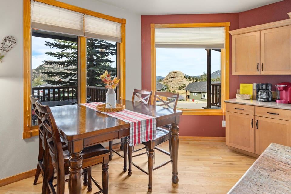 Dining nook with scenic window views