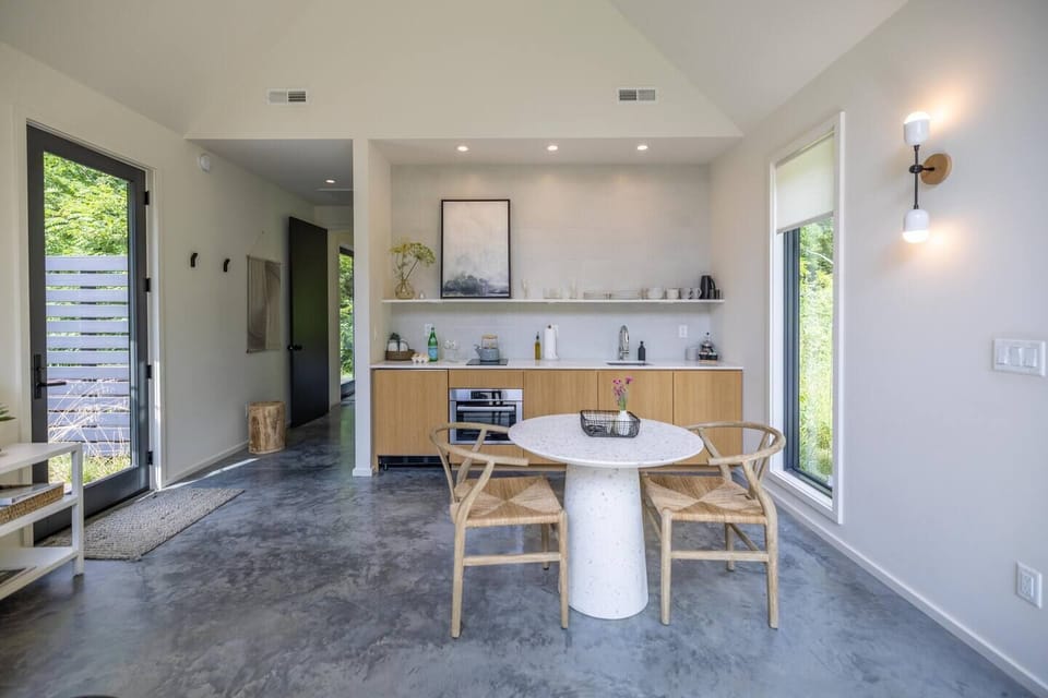 View of the kitchen and the hall leading to the bedroom and bathroom