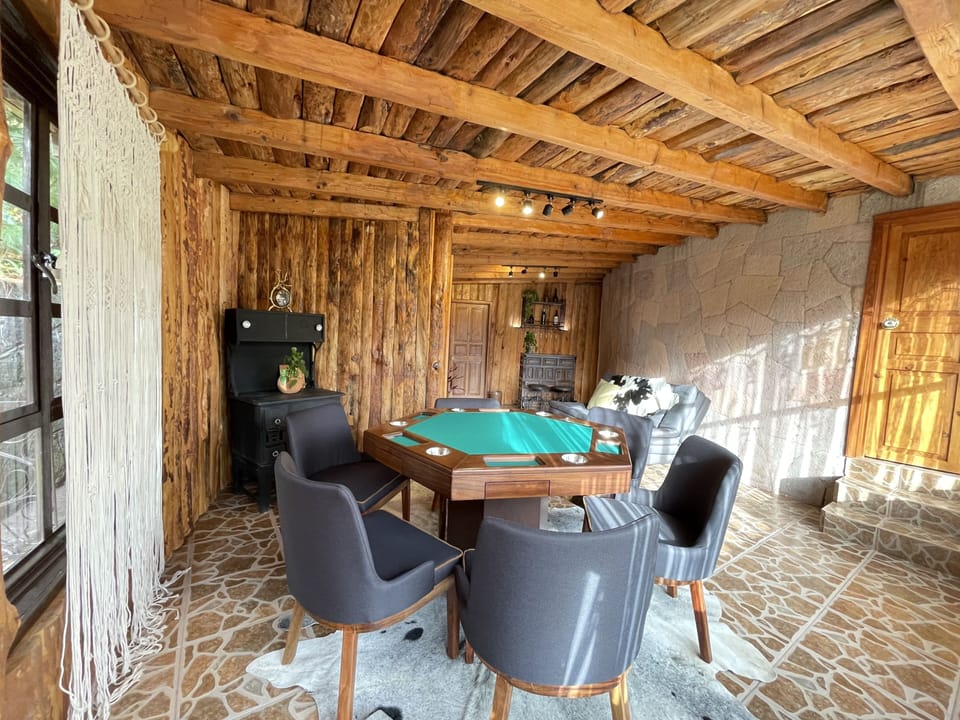 Deluxe Cabin | Living area | Flat-screen TV