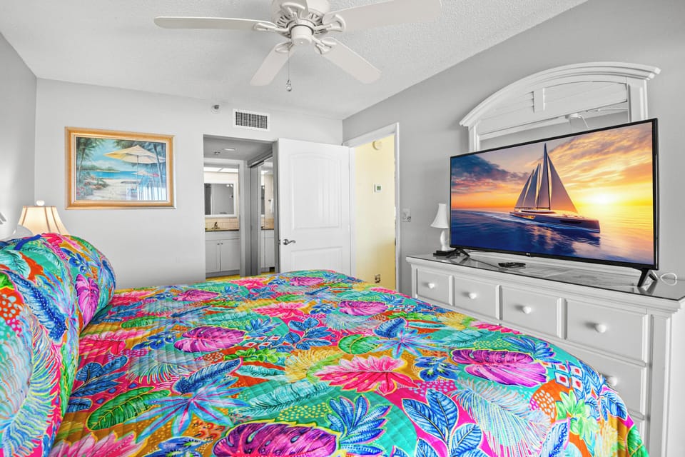 very comfortable king lift bed with a 65 inch TV
