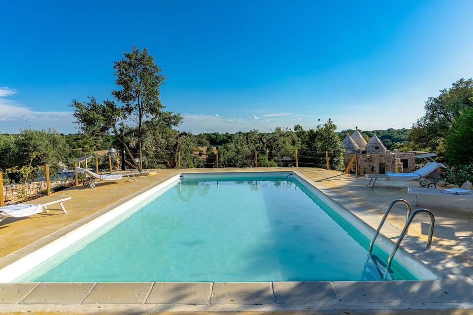 Water, Sky, Property, Plant, Swimming Pool, Azure, Tree, Shade, Rectangle, Leisure