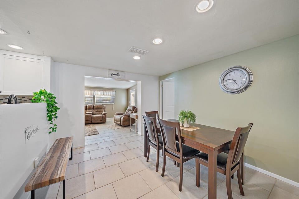 Main living room space leads to the dining room.