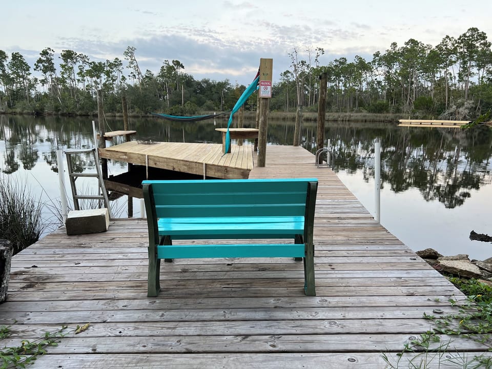 Dock in front of house. My favorite place to sit.