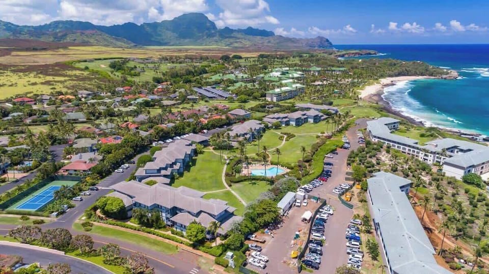 Aerial of Poipu Kai, Tennis Court and Pool and the Grand Hyatt (Green Roofs)