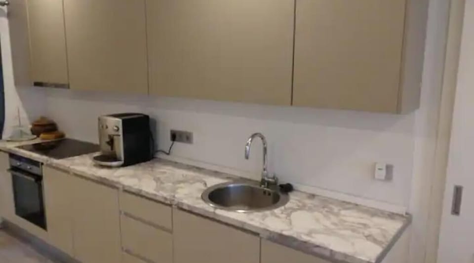 Full kitchen, stove, oven, hot/cold water and Espresso Coffee Machine