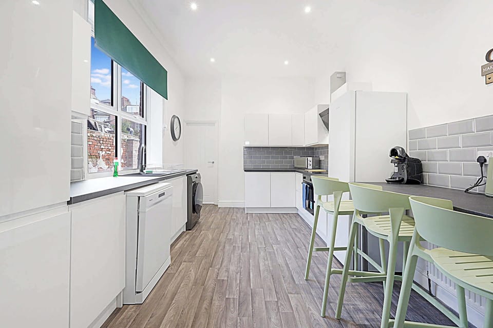Fuel up before heading out from this spacious, well-lit kitchen, equipped for everything from morning coffee to quick meals. The open layout and generous workspace make preparing food simple, convenient and comfortable during your stay.