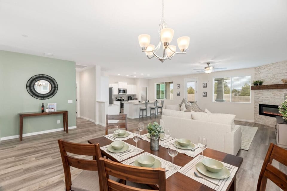 Spacious area with dining table and chairs!