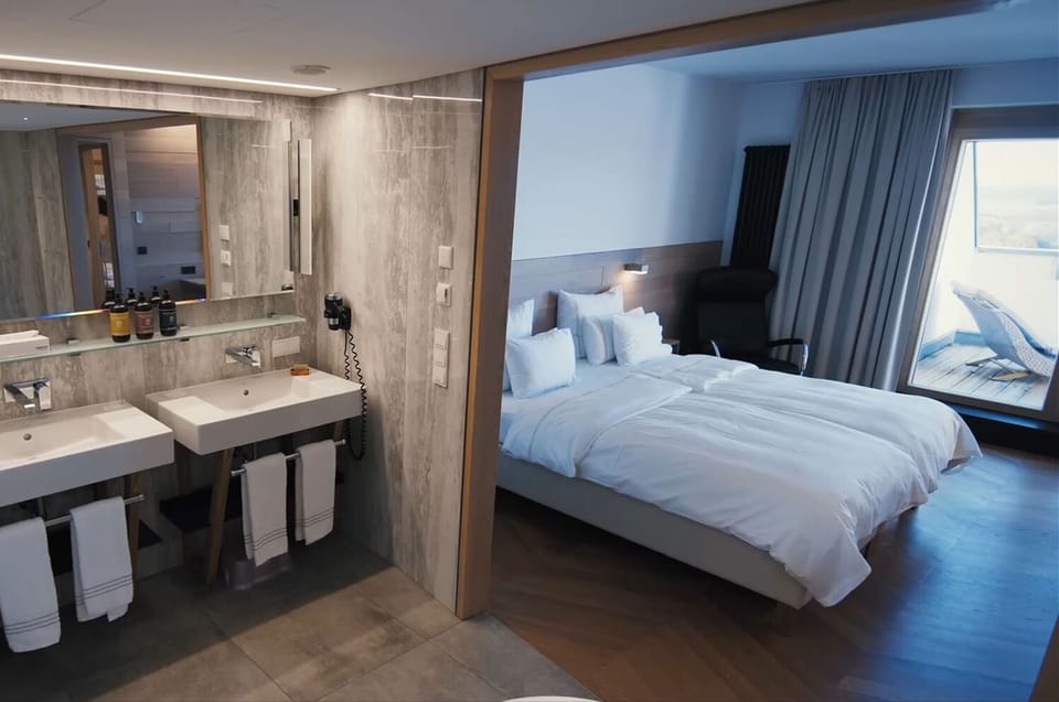 Signature Suite | Bathroom | Bathtub, designer toiletries, hair dryer, bathrobes