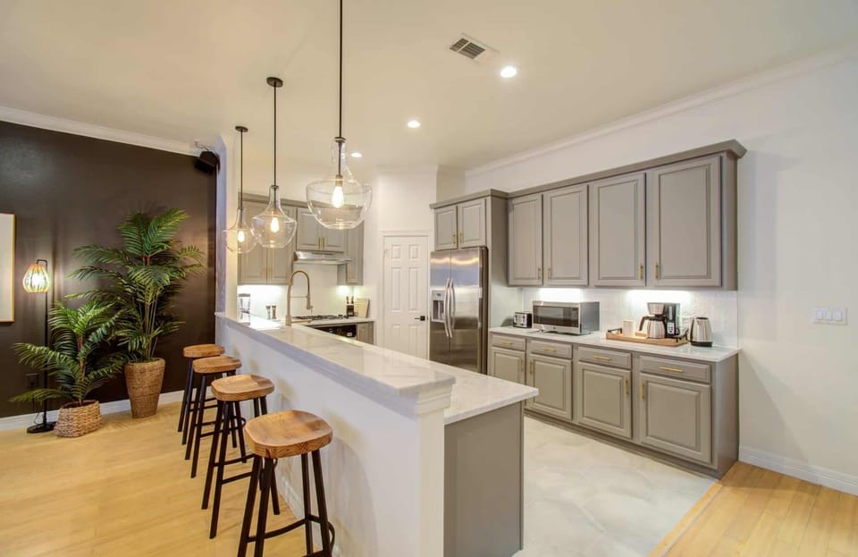 Modern, charming, and functional, this fully equipped chef’s kitchen offers plenty of space for you to unleash your inner culinary creativity.
