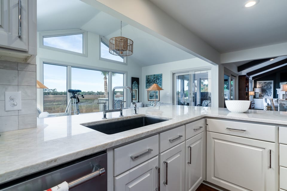 The dining area opens into the sun filled kitchen