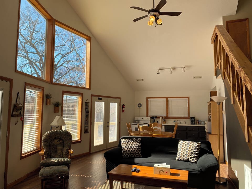 Comfort Chalet | Living area | 52-inch Smart TV with cable channels, streaming services