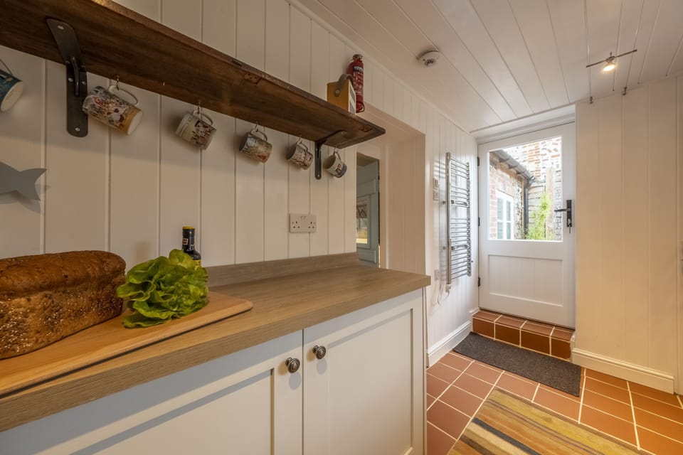 Ground floor: The kitchen door opens to the garden