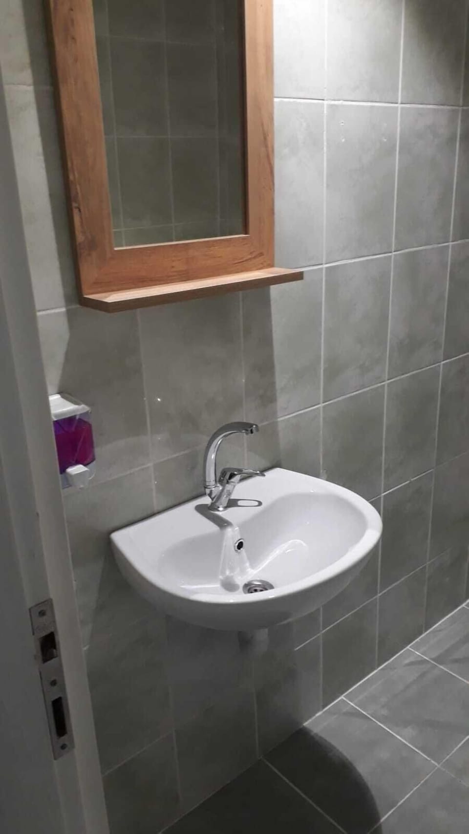Shower, free toiletries, hair dryer, slippers