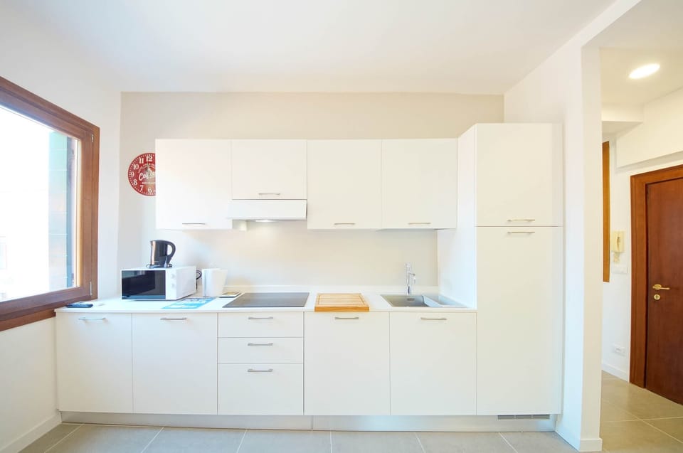 Apartment | Private kitchen | Full-size fridge, microwave, stovetop, dishwasher