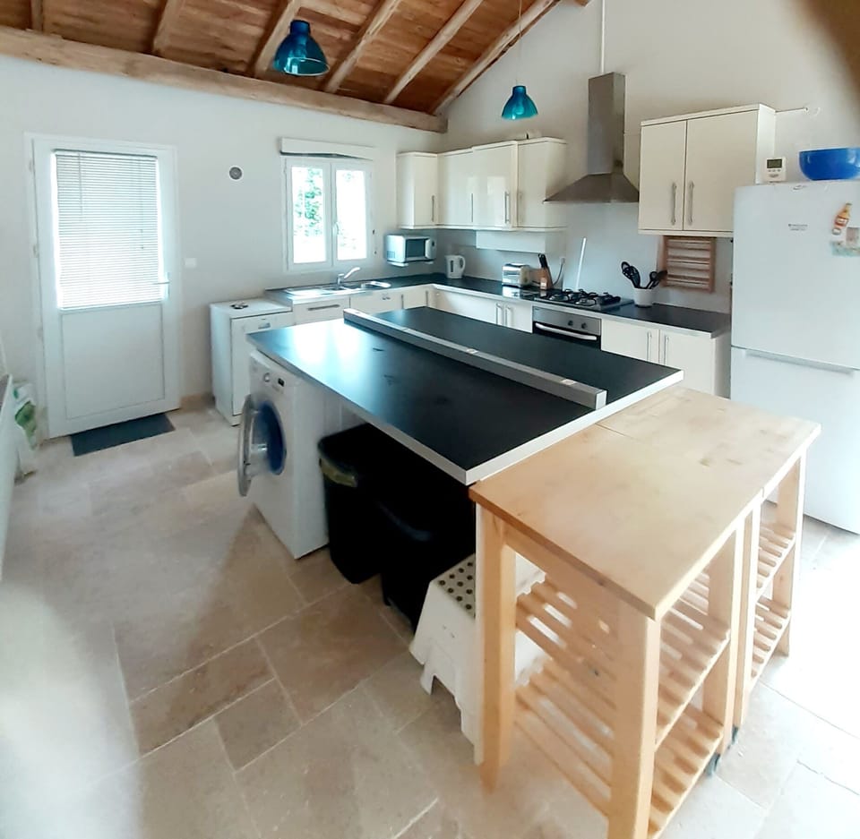 A well equipped kitchen and a table that seats 6 for dinner