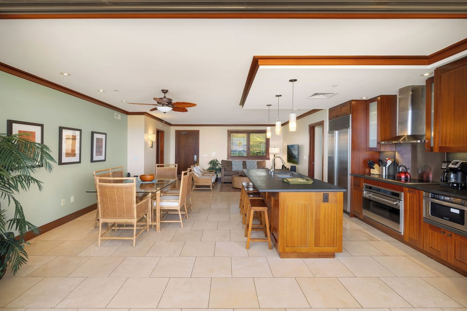 Your stunning open-concept kitchen flows seamlessly into elegant dining and living spaces, perfect for gathering and creating memories.