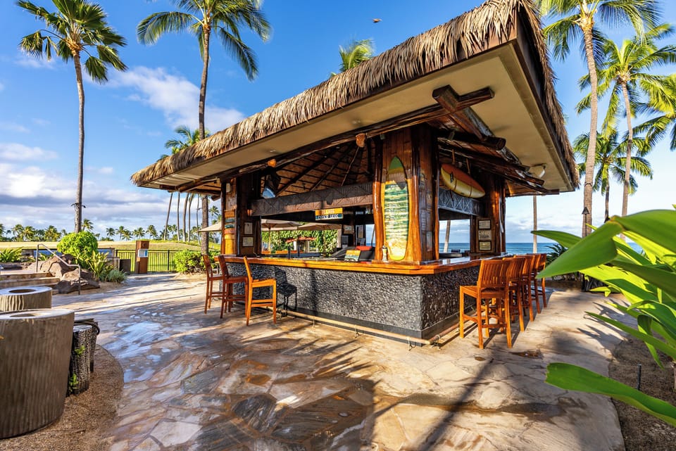 Pull up to the thatched bar for an afternoon round by the water.