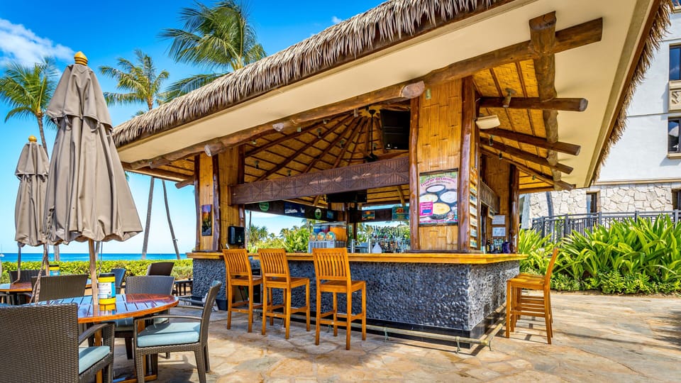 Palm trees and tropical drinks by the sea.