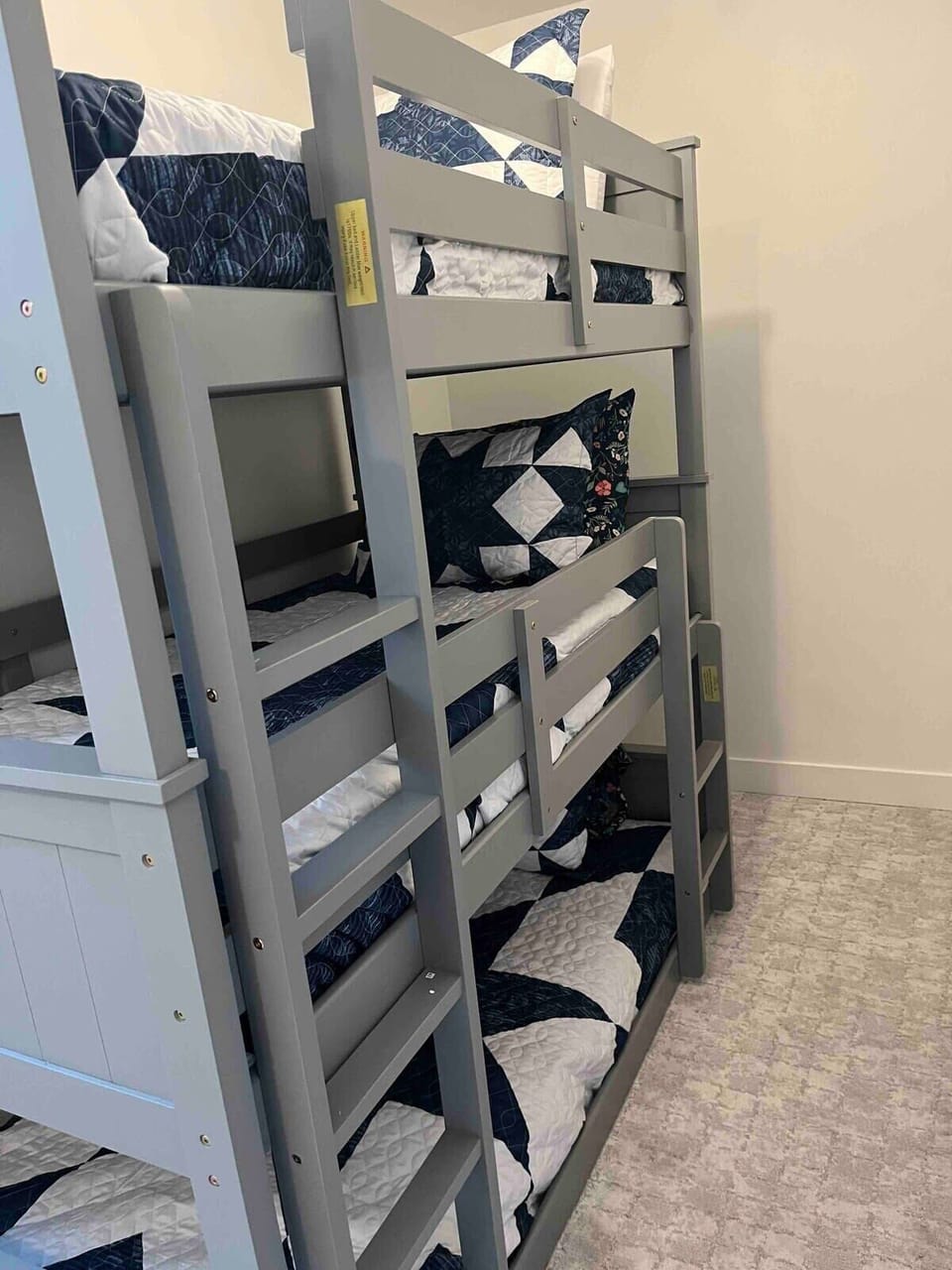 Triple bunk in basement. 