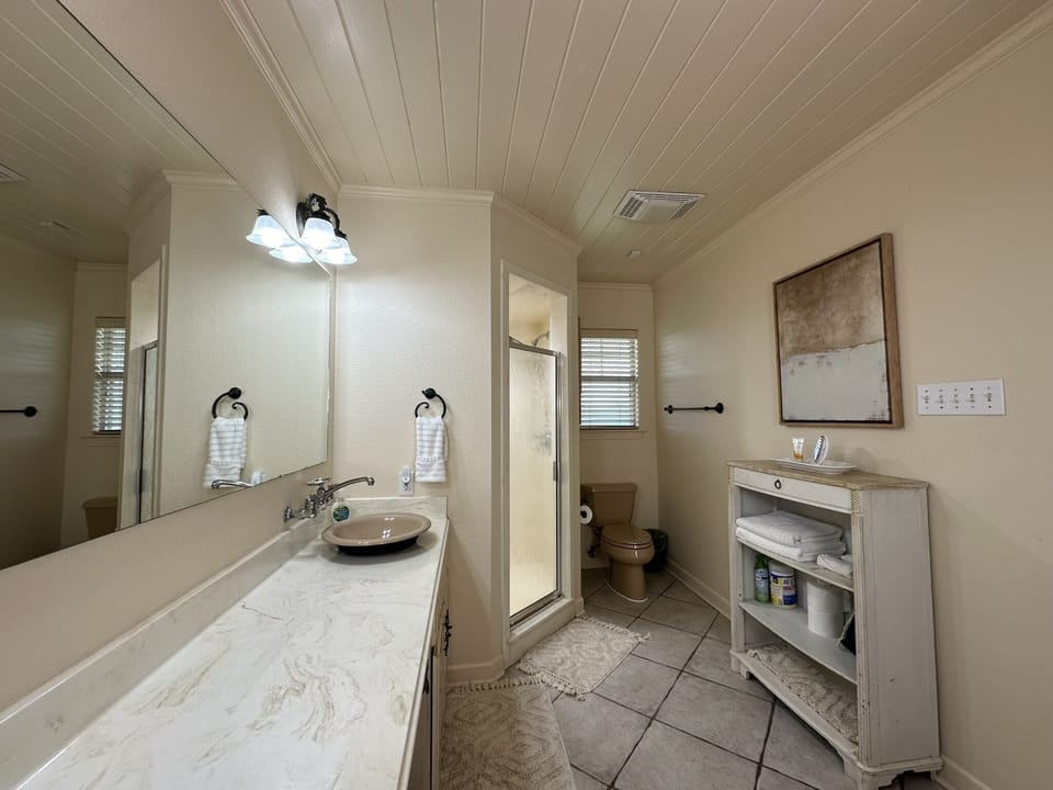 King Bathroom with double sinks.
