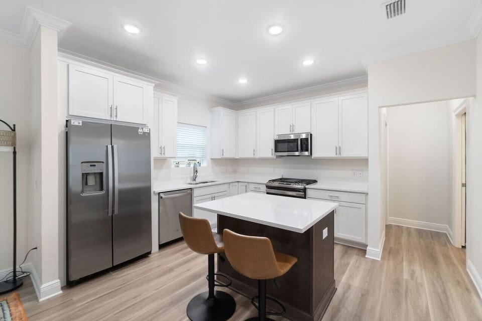 Fully equipped kitchen with all cooking and baking supplies, gas stove, and dishwasher. Kids dishes available.Dining area seats 6 with 4 at the table and 2 at kitchen island. Regular drip coffee maker. We provide filters.