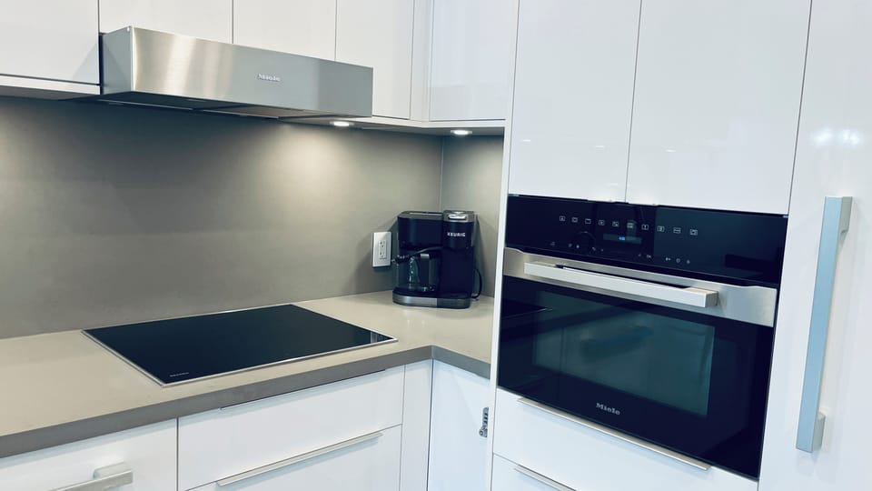 Miele built in Convection Oven Microwave, Induction Cook Top, Keurig coffee.