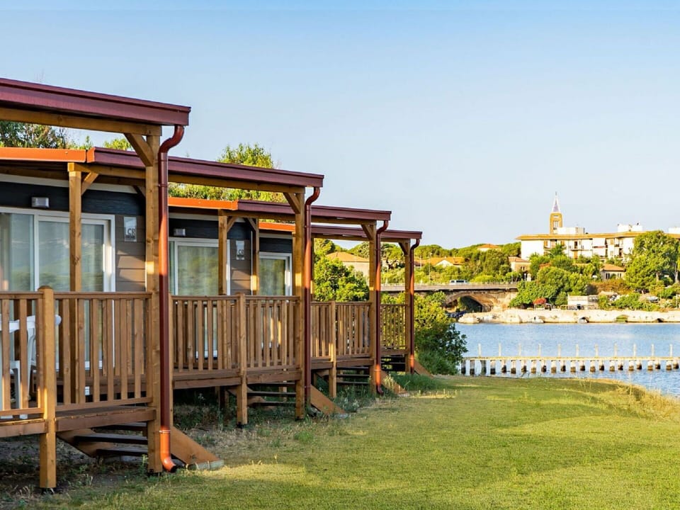 Water, Sky, Property, Swimming Pool, Azure, Cloud, Seaside Resort, Outdoor Furniture, Plant, Tree