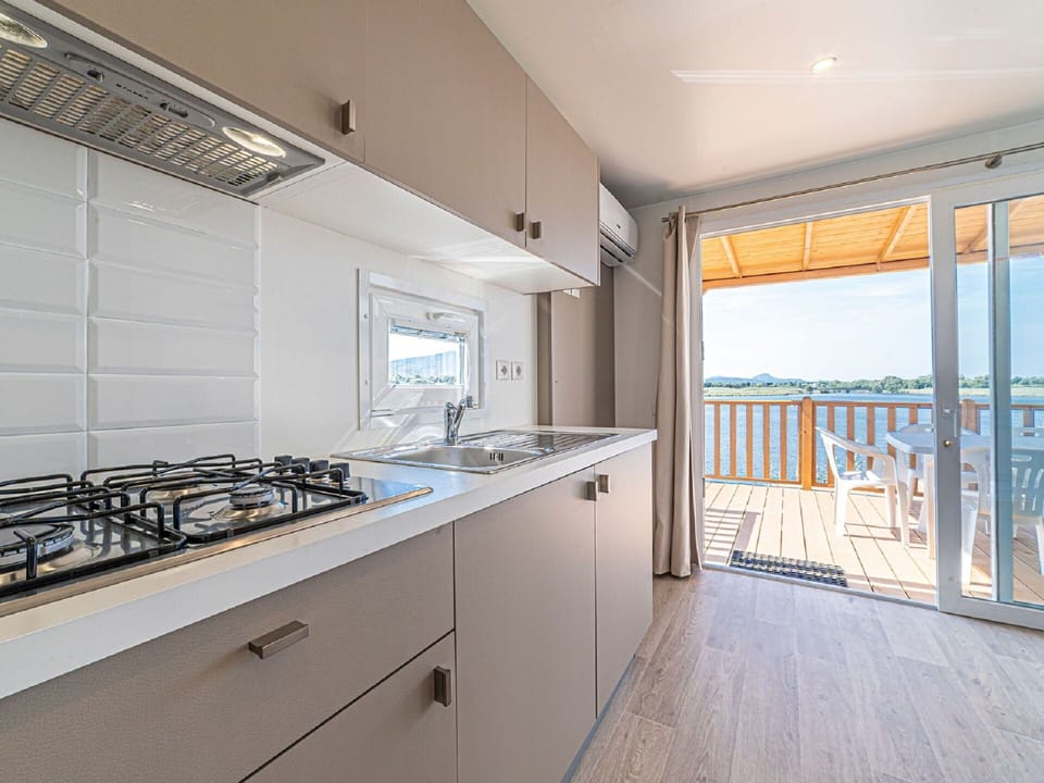 Water, Sky, Property, Swimming Pool, Azure, Cloud, Seaside Resort, Outdoor Furniture, Plant, Tree