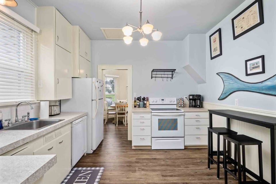 The kitchen is spacious and efficient. Perfect place to prepare a family meal.