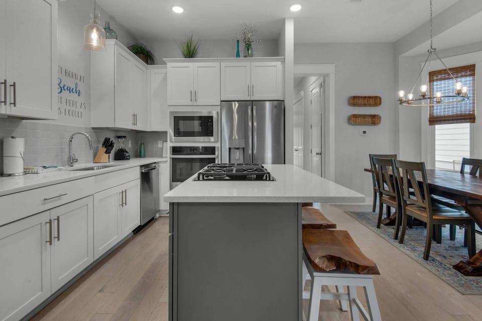 Well appointed open concept kitchen with seating for 9