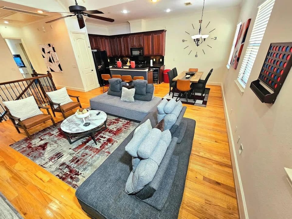 "Playful and fun: Enjoy a unique twist with a life-size Connect Four game mounted on the wall, providing entertainment for all ages."