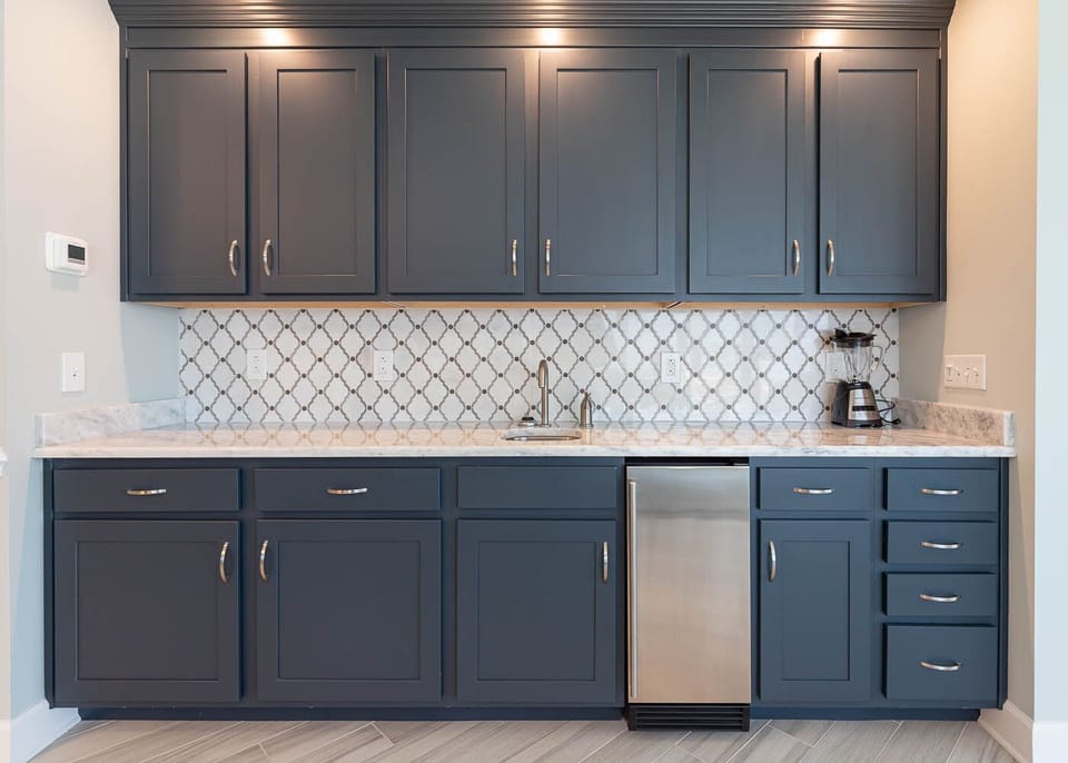 Grab a chilled drink from the fridge or create your favorite cocktail at the wet bar