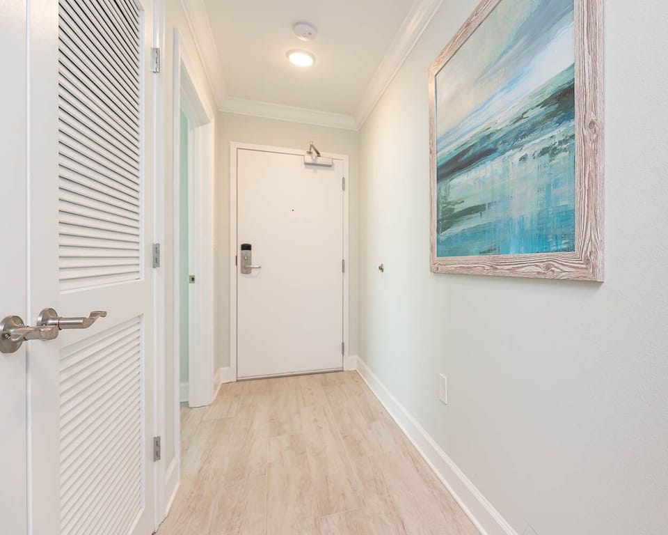 Step inside this welcoming entry with coastal decor that invites you to explore this beachfront vacation rental