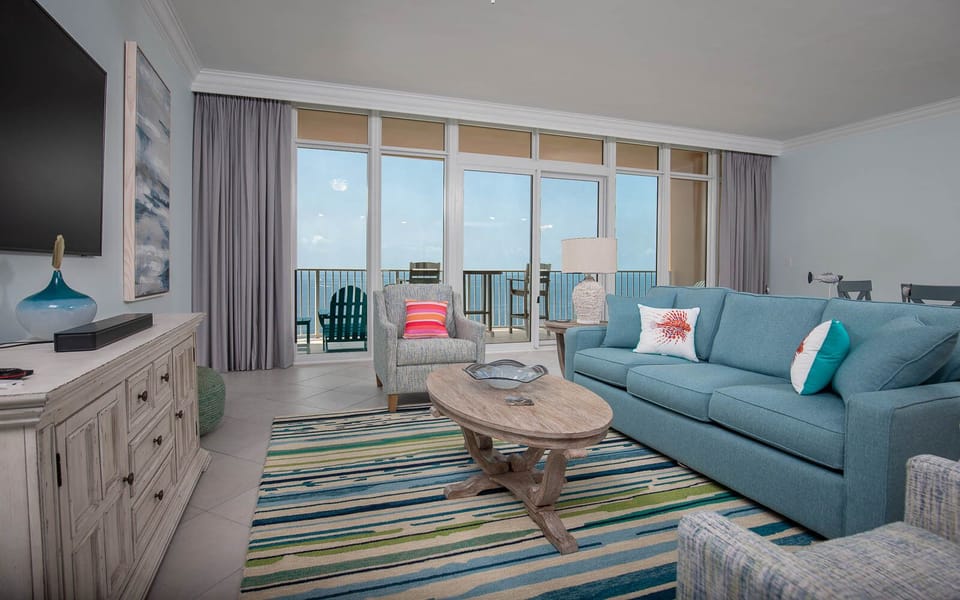 Relax on the roomy sofa with queen sleeper, step onto the balcony, and gaze at the gulf from the balcony