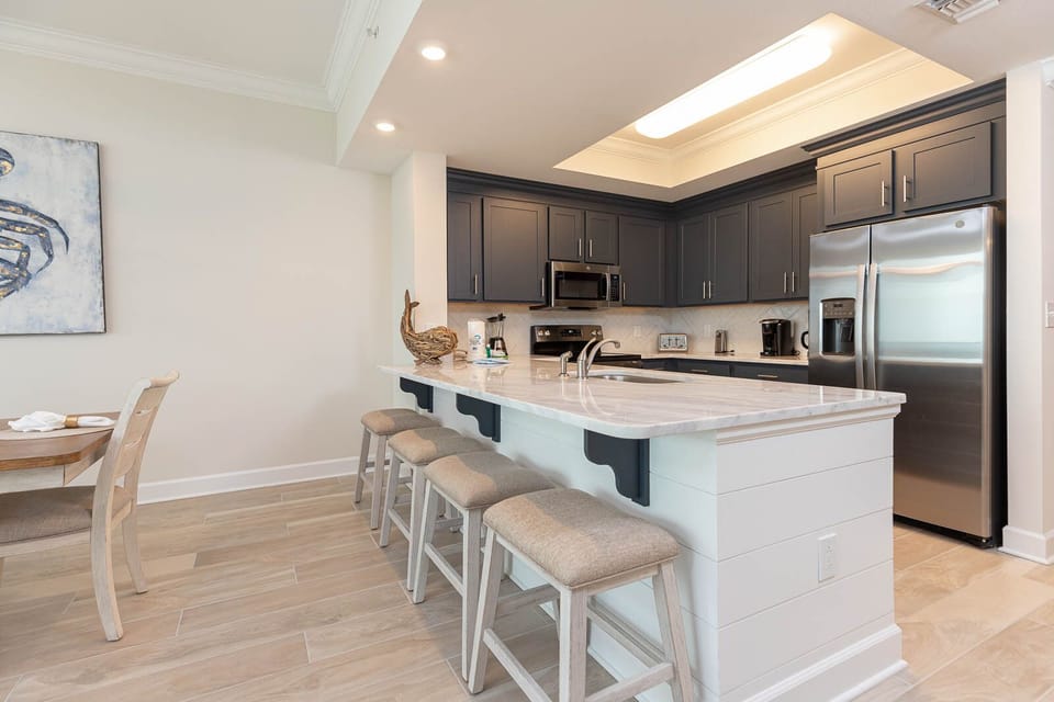 Gather around the breakfast bar for a casual meal or morning coffee