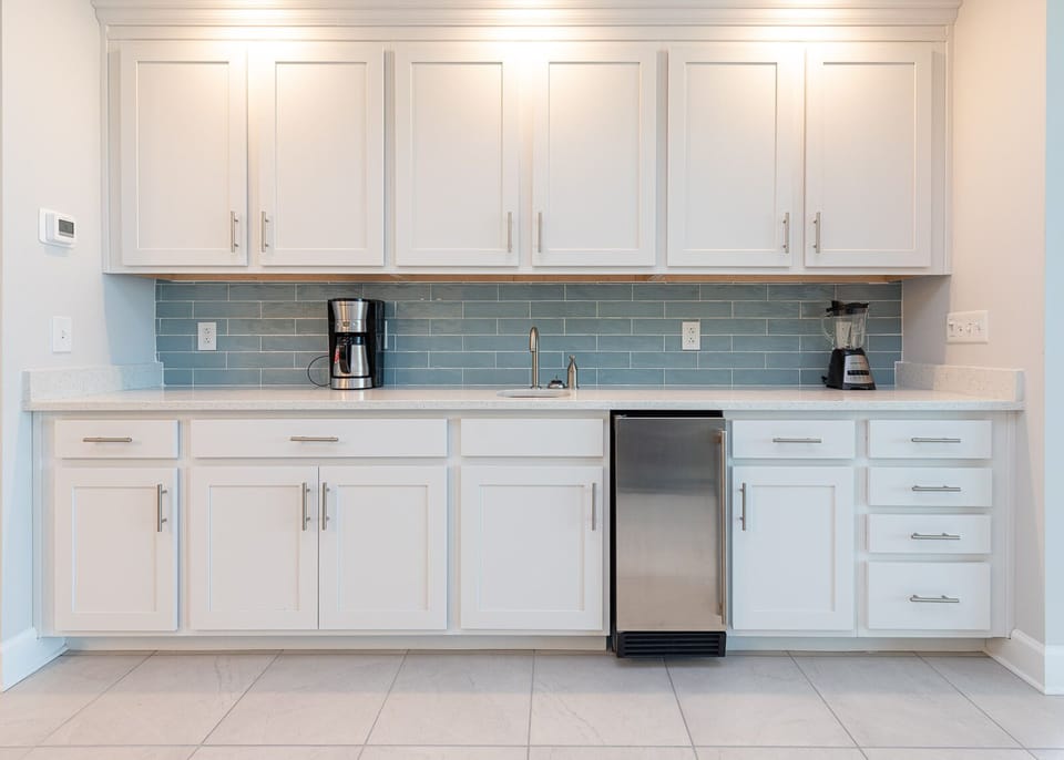 Blend smoothies at the wet bar and grab a chilled drink from the stainless mini fridge