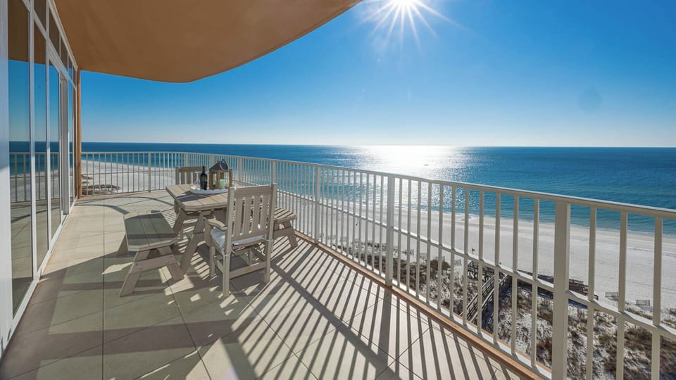 Relax on the balcony and watch sunlight glitter on the gulf while coastal breezes reach you