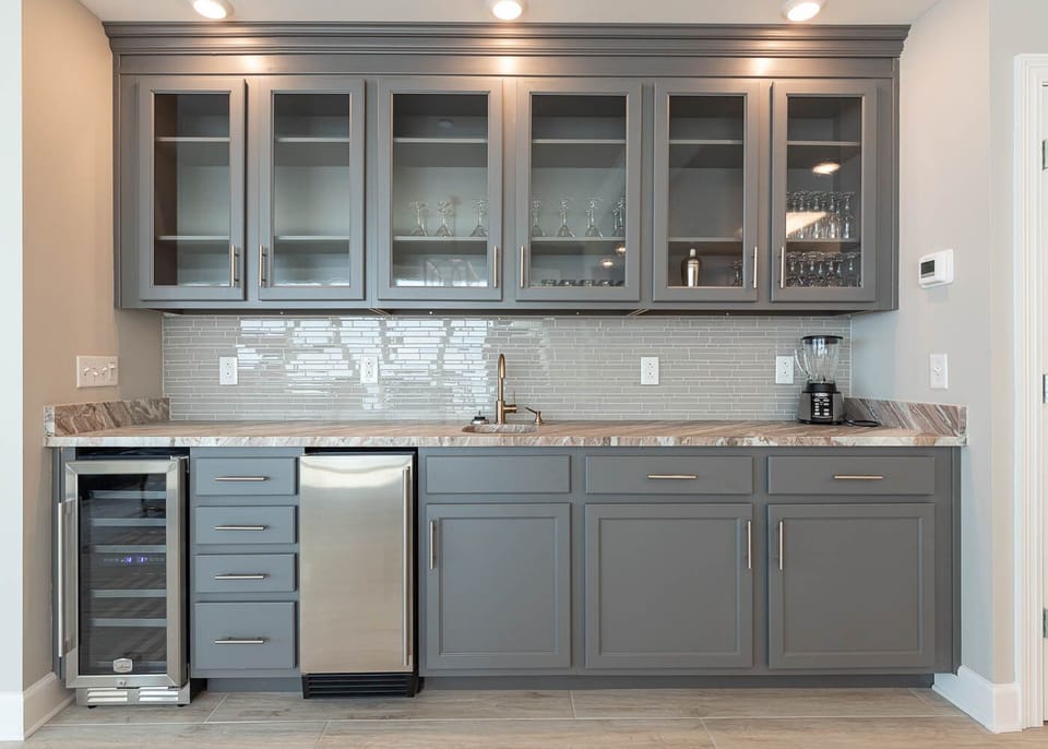 Grab a chilled bottle from the wine cooler, blend a smoothie, or create your favorite cocktail at the wet bar