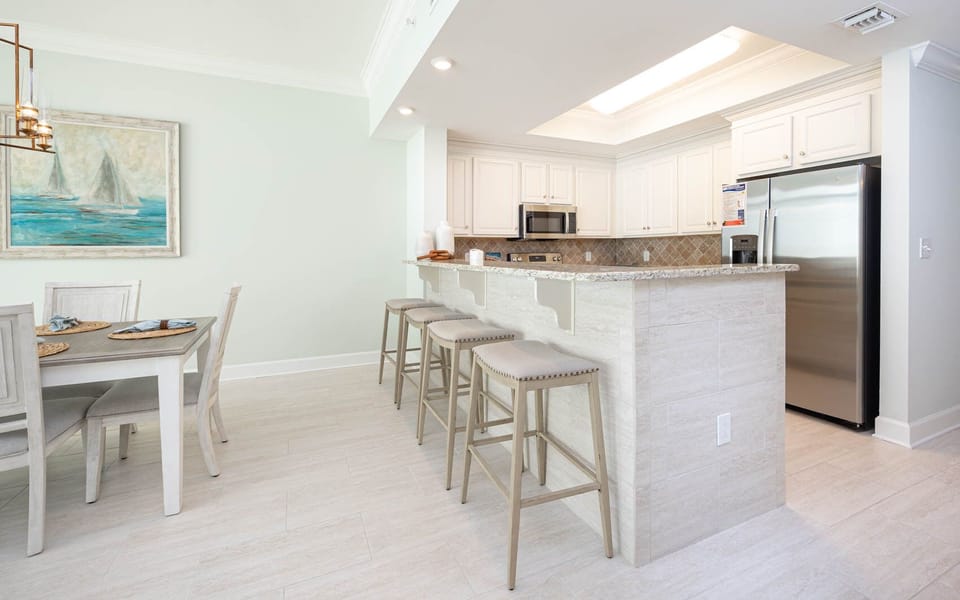 Slide onto a stool at the breakfast bar and chat while enjoying your morning coffee