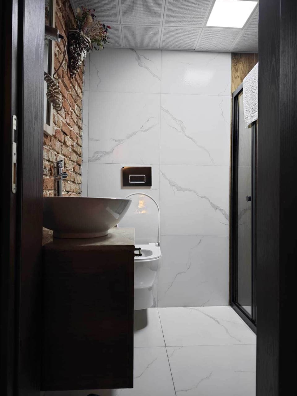 Classic Single Room | Bathroom | Shower, hair dryer, slippers, heated floors