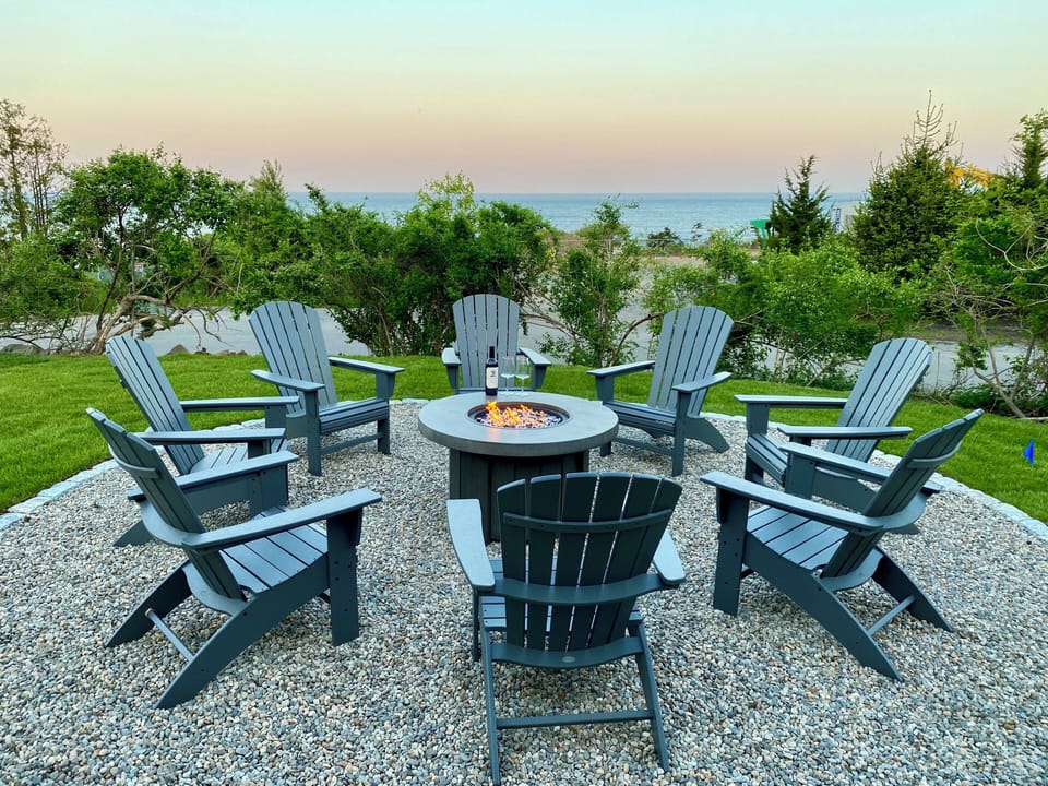 Propane firepit with Adirondack chairs and Ocean views!
