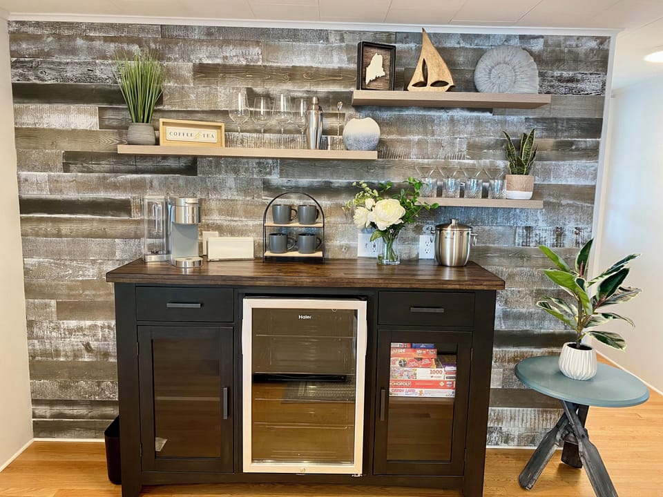 Coffee/cocktail bar with refrigerator. Games and puzzles in the cabinet. 