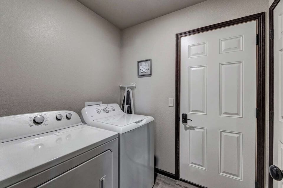 Ground floor washer and dryer off main living area and garage.