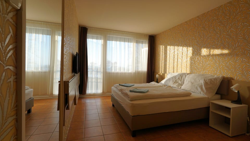 Twin Air-conditioned Room | Iron/ironing board, free WiFi, bed sheets