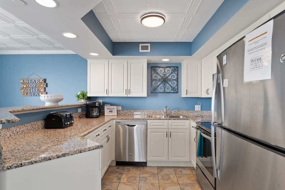 - Fully equipped kitchen with stainless steel appliances   - White cabinets and granite counters for easy meal prep   - Perfect for cooking and dining during Myrtle Beach stay