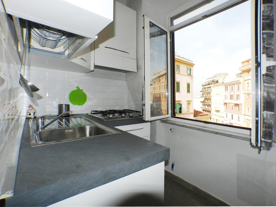 Full-size fridge, microwave, stovetop, toaster