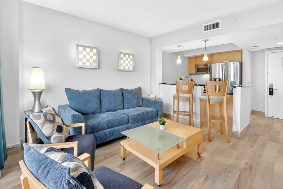 Bright and comfortable living space with stylish seating and a relaxing atmosphere.